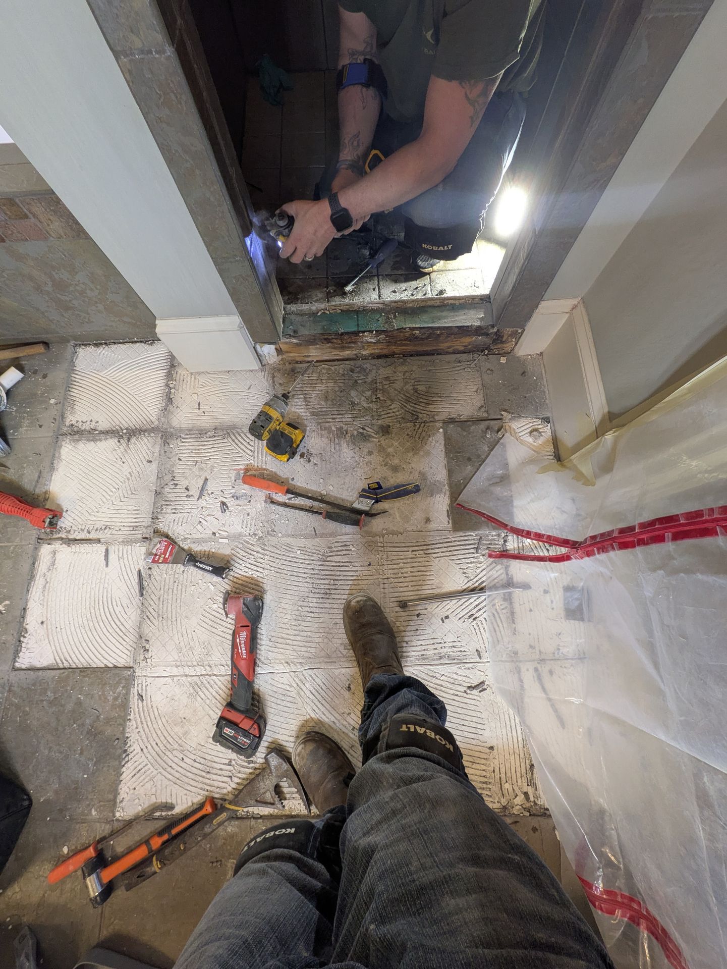 Contractor floor protection paper laid in an Athens GA hallway